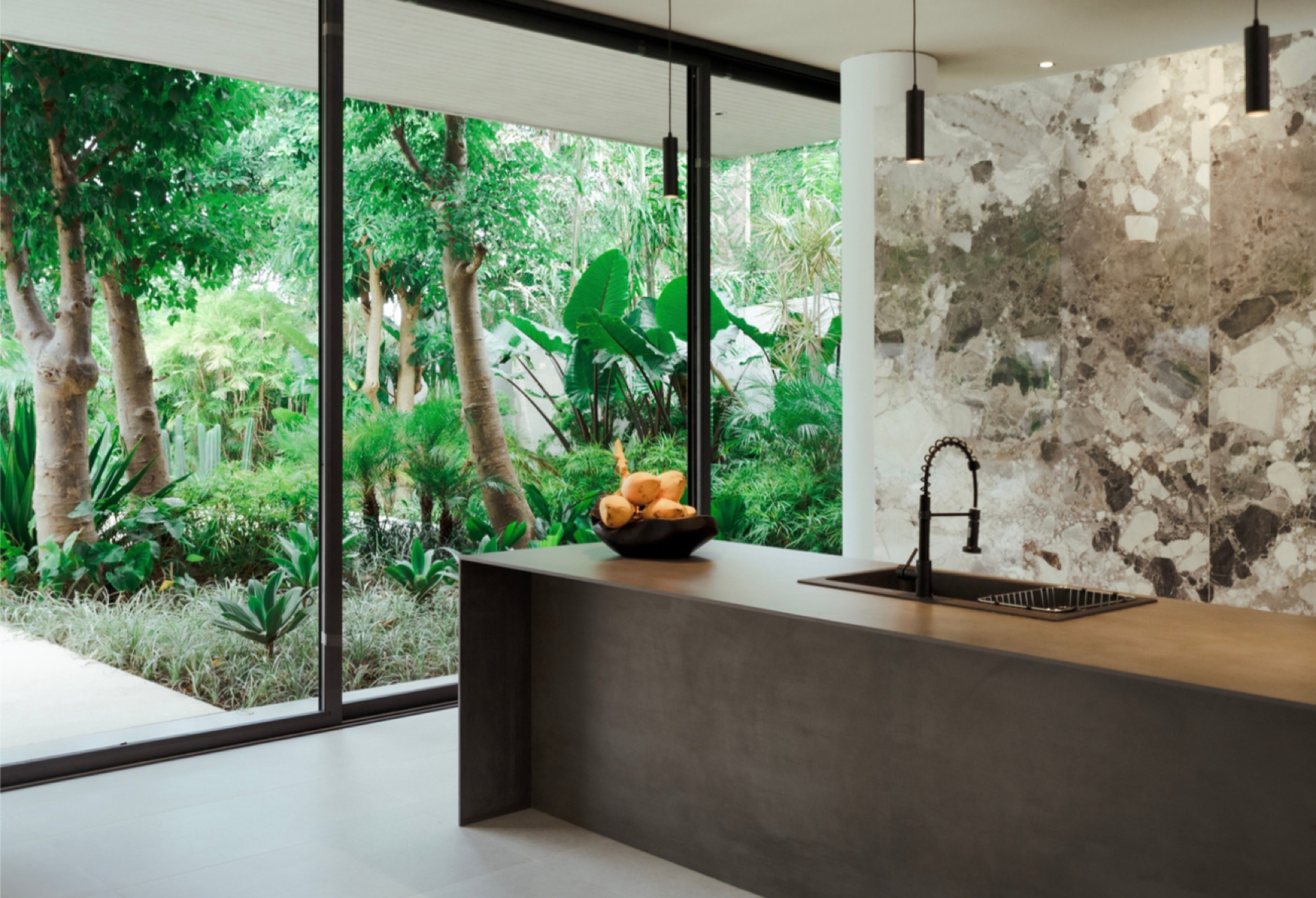 House SJ — volcanic stone wall detail